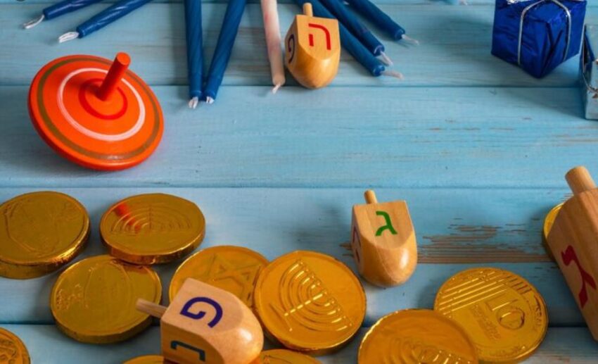 The Interfaith Family Negotiating December Through a Single Dreidel Game